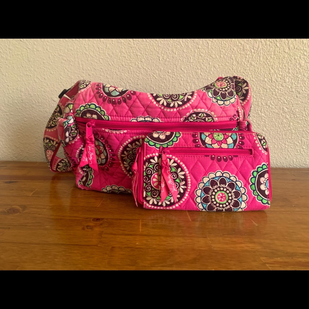 Vera Bradley pink handbag with matching wallet.